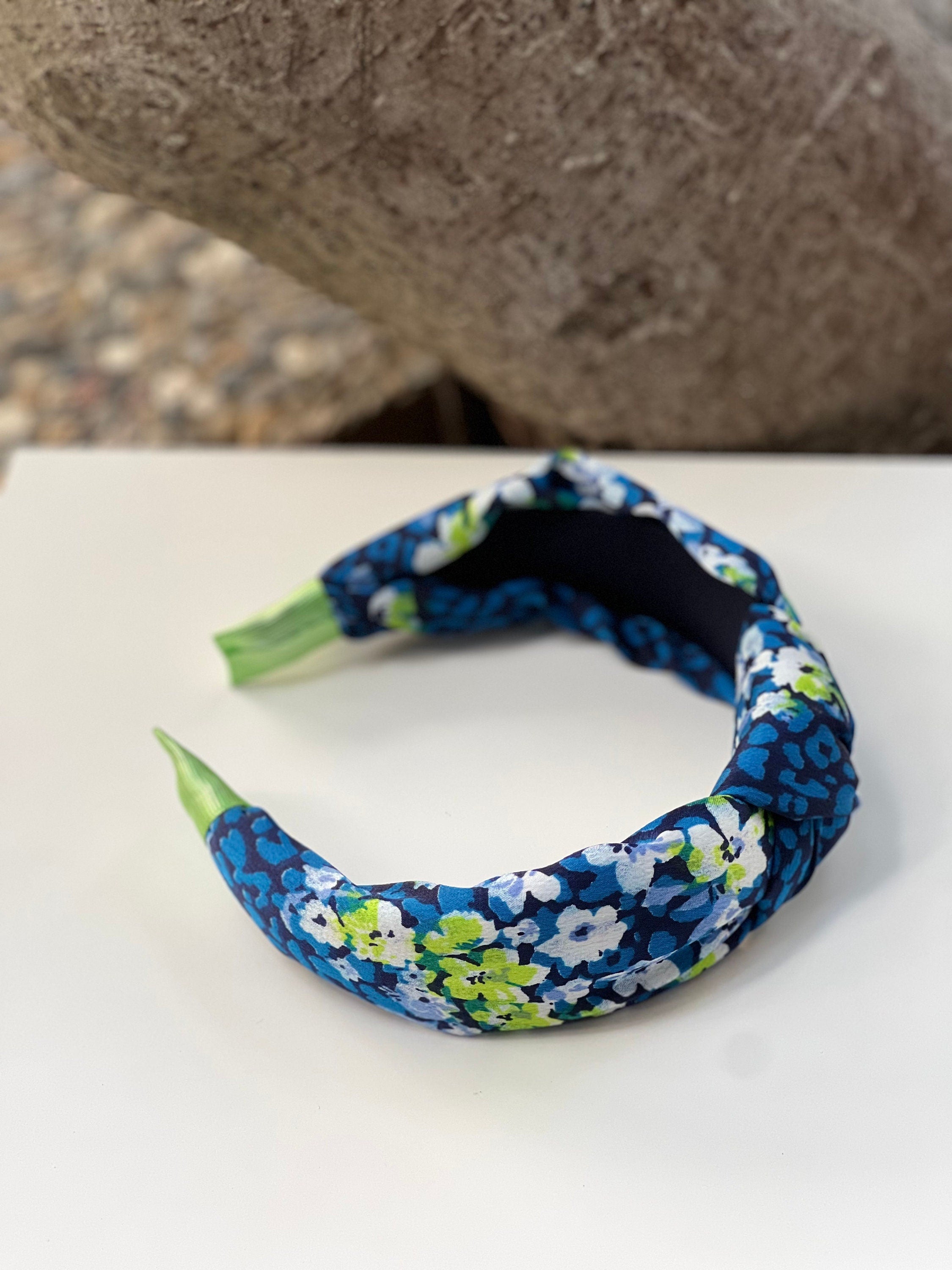 A Colorful Hairband featuring a variety of vibrant hues that make a statement.