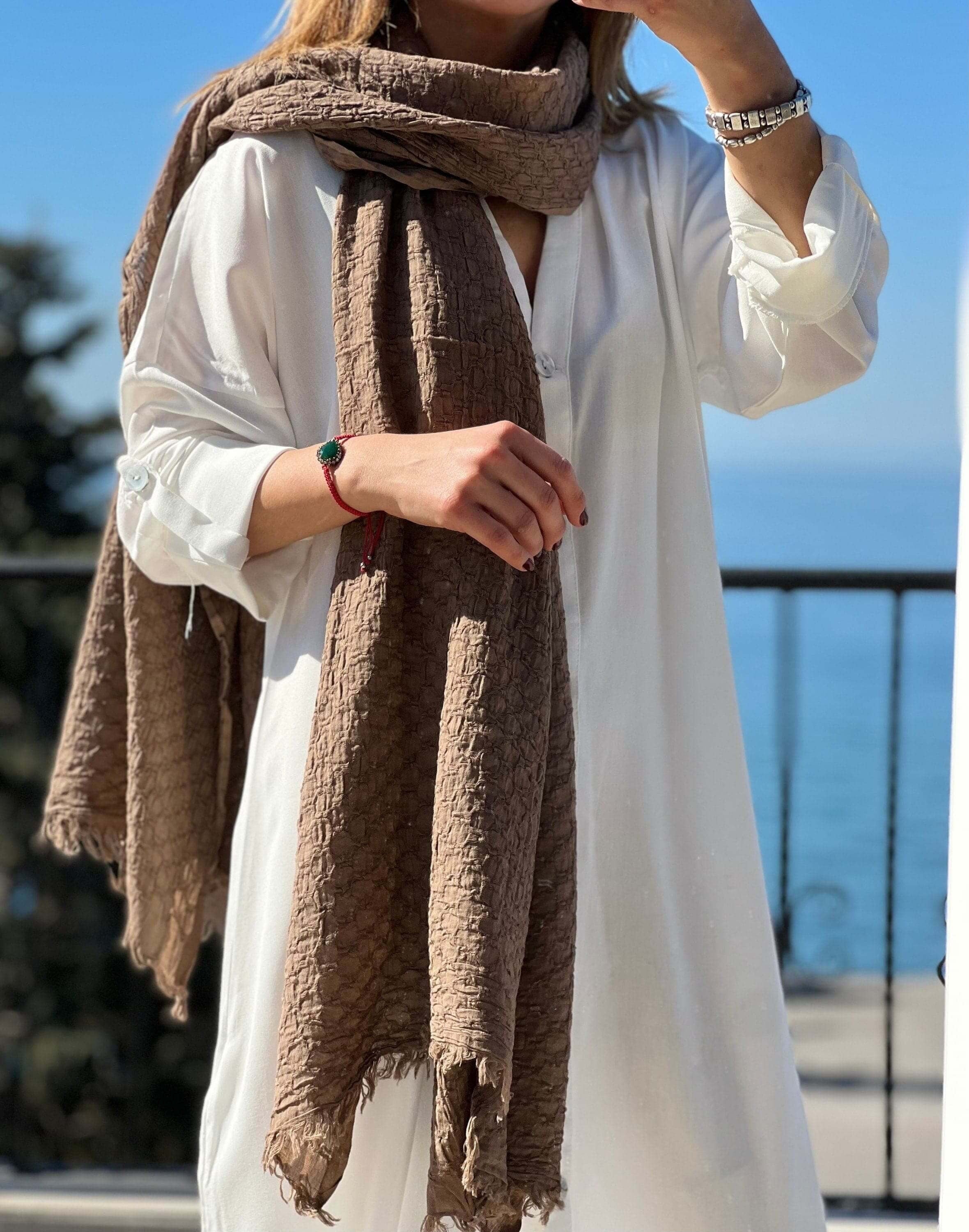 Stay cozy and stylish with this 100% organic cotton mink color rectangle scarf, a versatile and soft accessory for all seasons and a great gift for any woman.