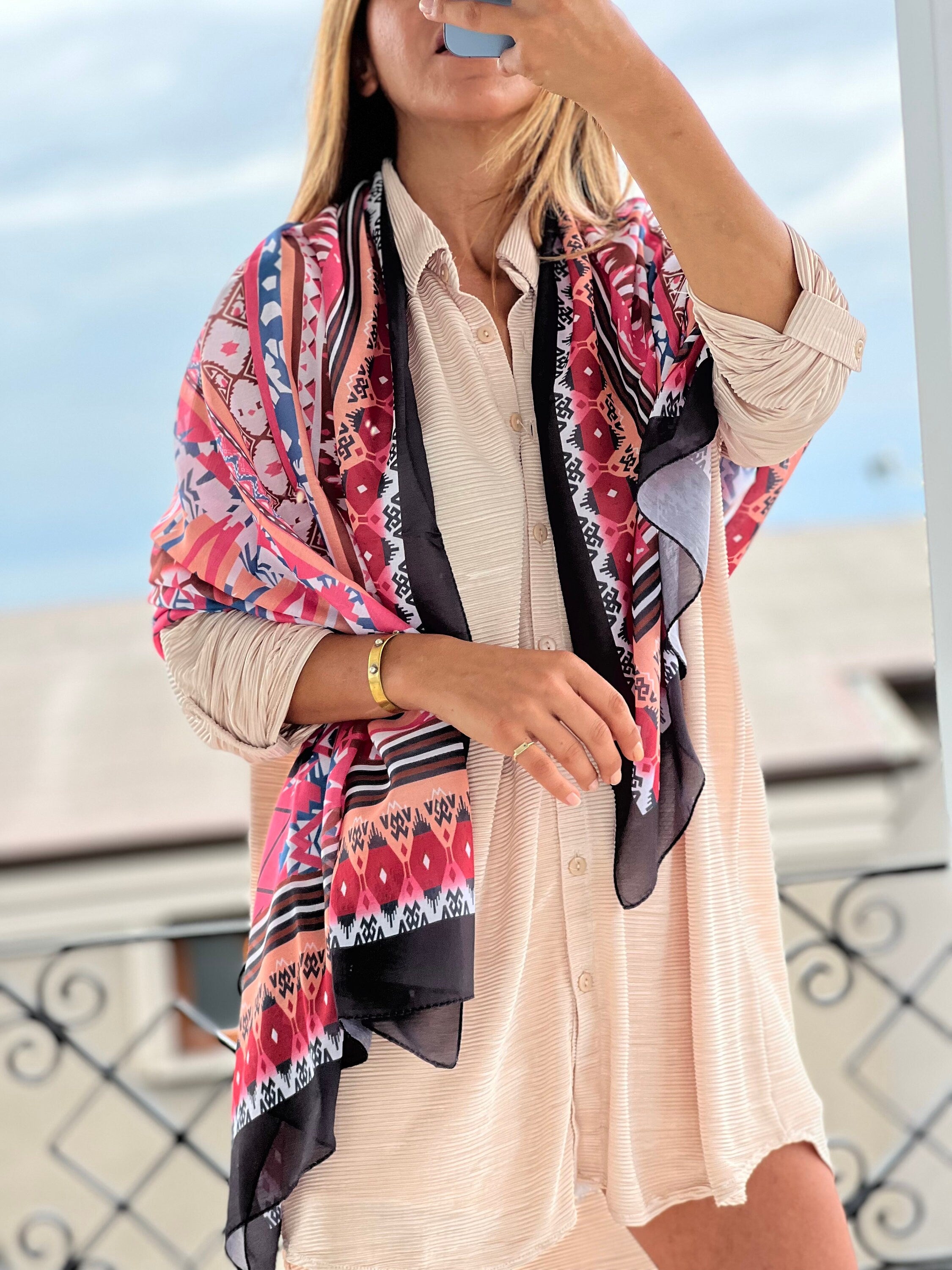 Add a pop of color to your look with this Large Cotton-Viscose blend voile scarf in shades of pink, green, and black. Ideal for all seasons, this scarf features a unique and authentic pattern that is both stylish and cozy.