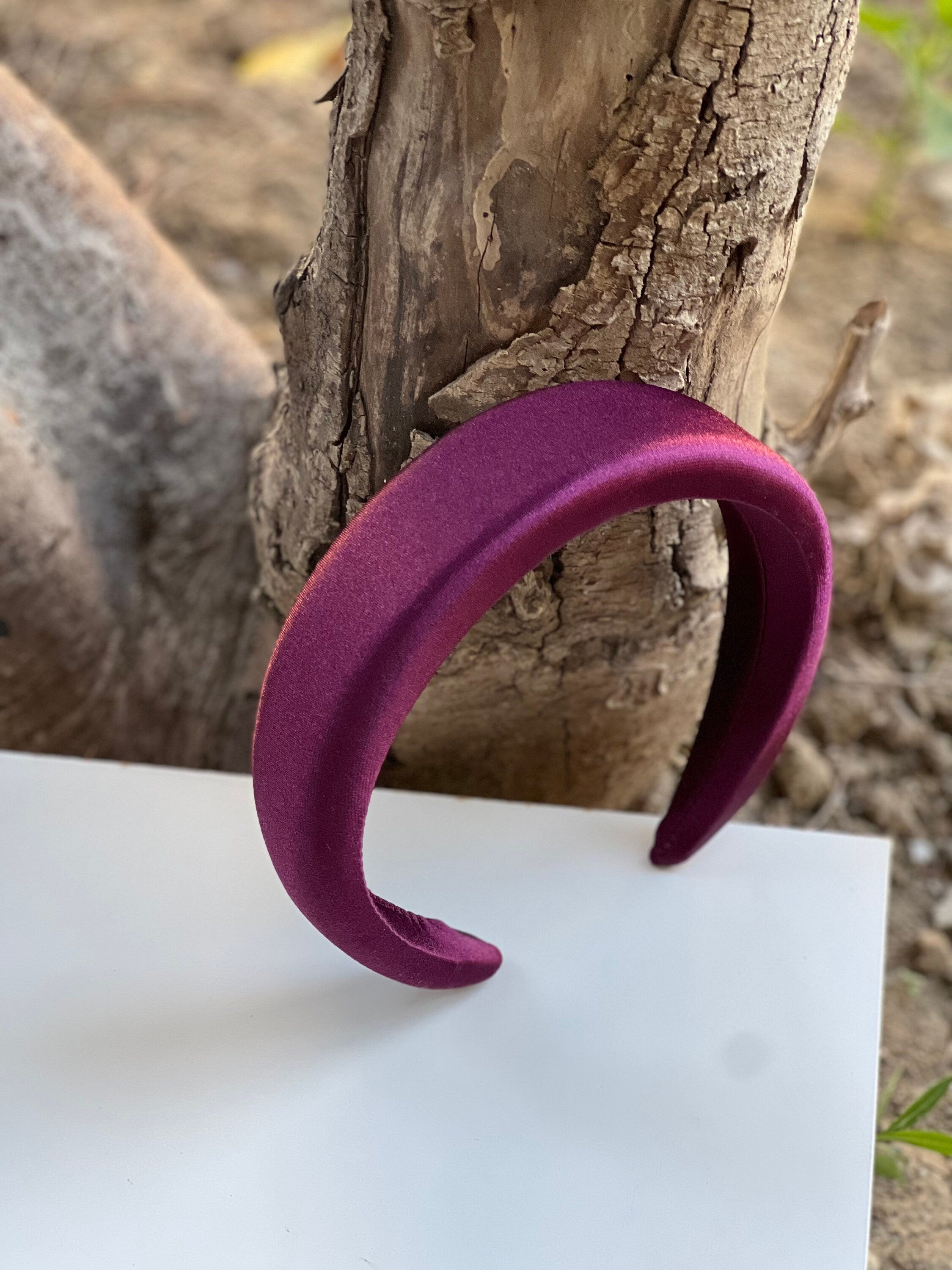 Wine-colored headband perfect for adding a touch of sophistication to any outfit.
