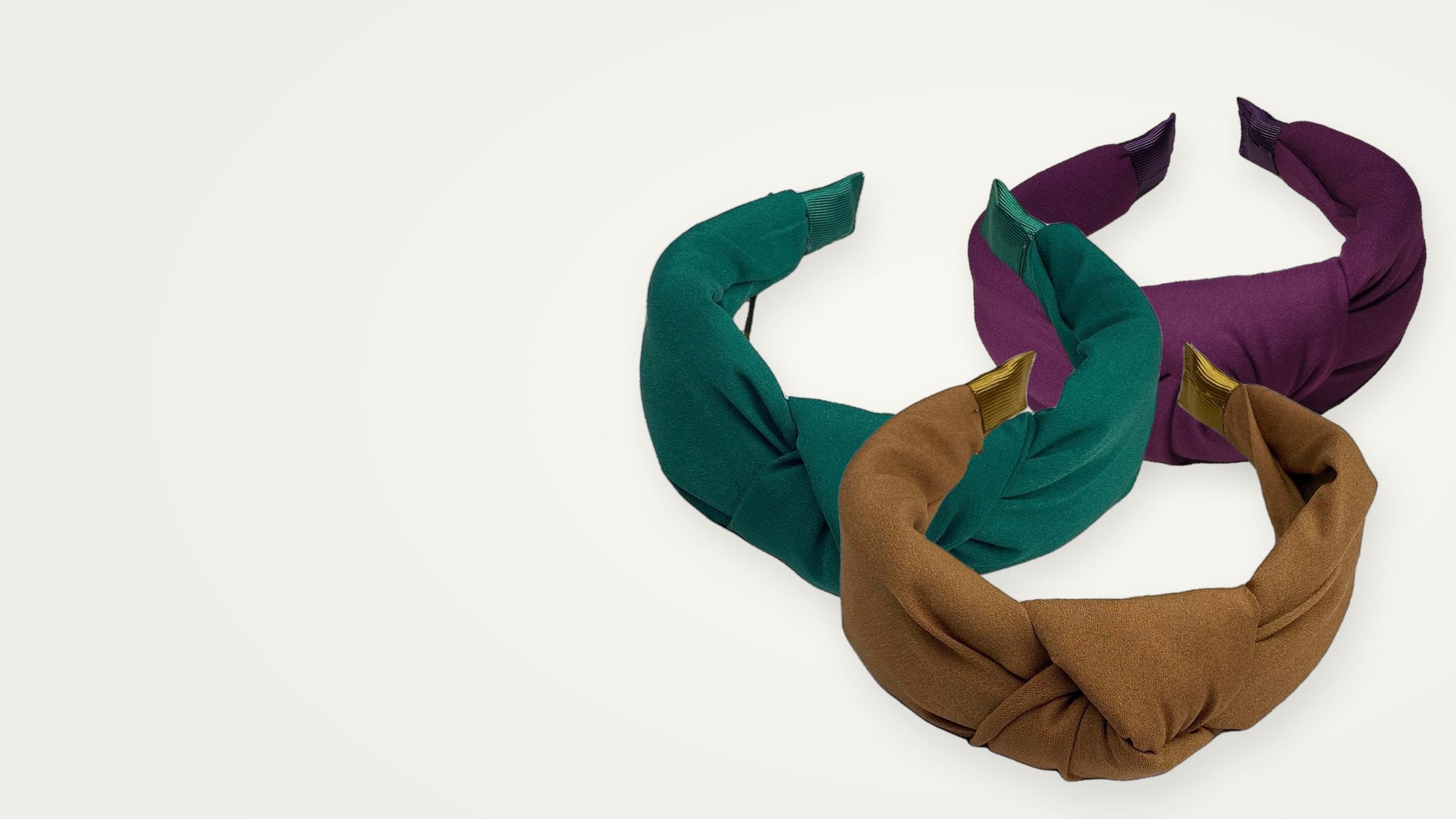 Emerald, caramel and plum knotted headbands by Moyoni